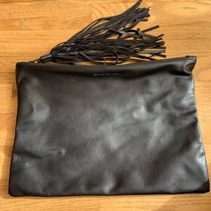 Black handbag with fringe style zipper